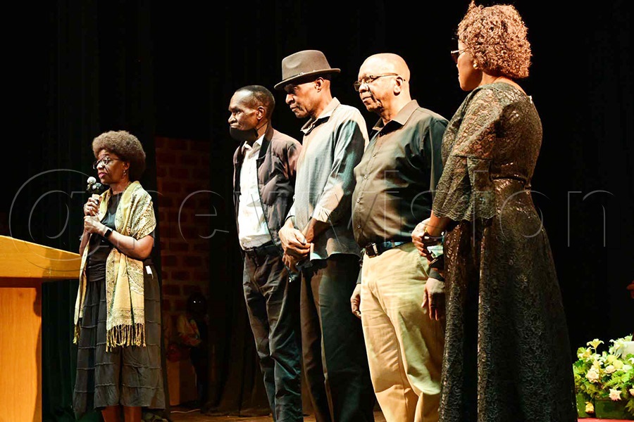 Kaaya Kavuma, along with other performers, addressing mourners. Photo by Ignatius Kamya.