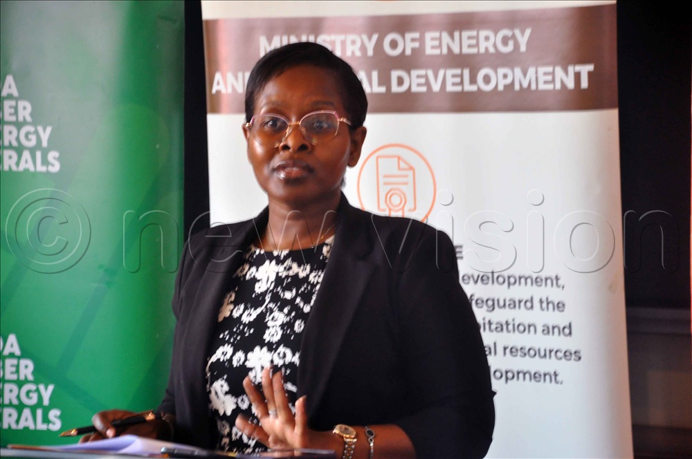 Gloria Sebikari, manager of corporate affairs and public relations at Petroleum Authority of Uganda addressing the media at Amber House. (Photo by John Odyek)