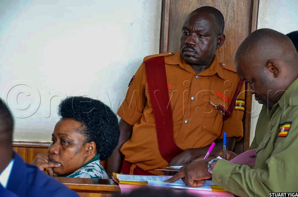 Centre for Constitutional Governance executive director, Sarah Bireete, in a court dock, following the proceedings. (Credit: Stuart Yiga)