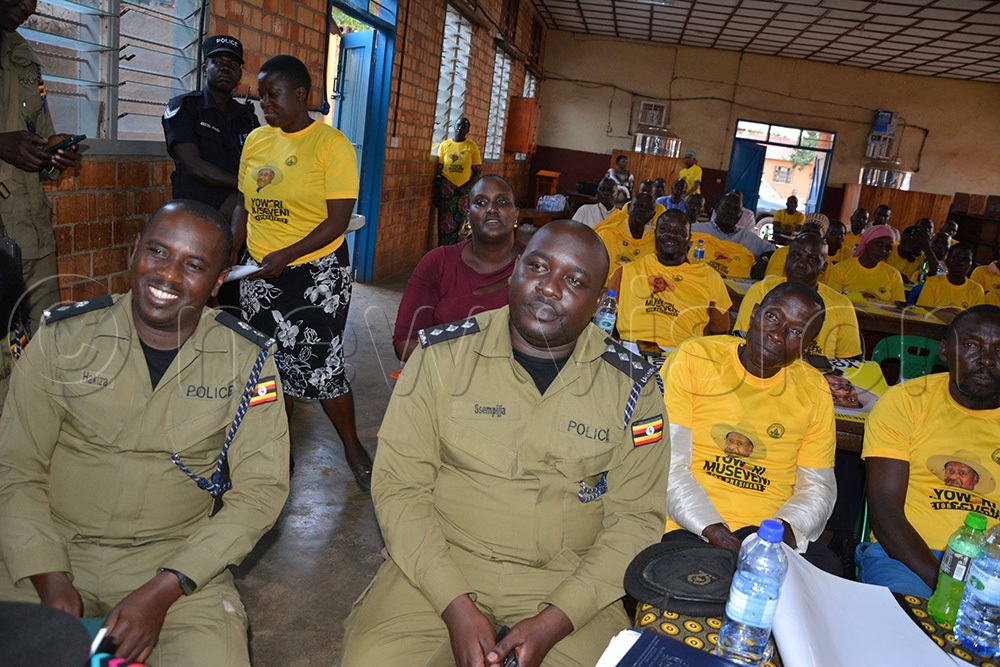 Julius Hakiiza, the Albertine police spokesperson (L) with his deputy  SSempijja attending the meeting. (Photo by Peter Abaanabasazi)