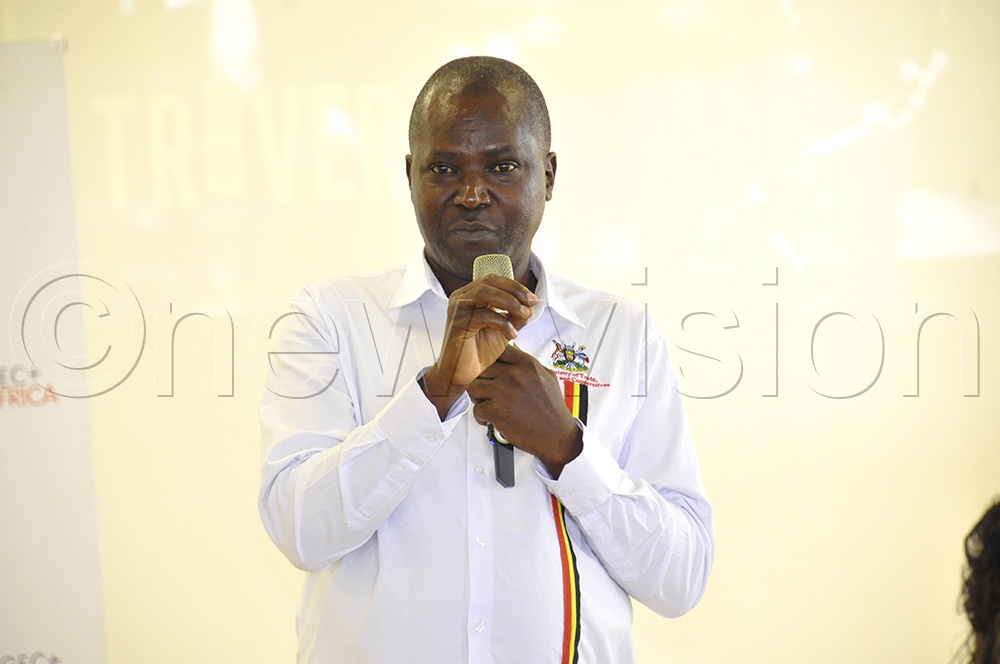 Johnson Abitekaniza, Assistant Commissioner for Business Skills Development at the Ministry of Trade, Industry and Cooperatives, addresses participants during the launch of Global Entrepreneurship Week at Enterprise Uganda on October 14, 2026. (Photo by Nancy Nanyonga)