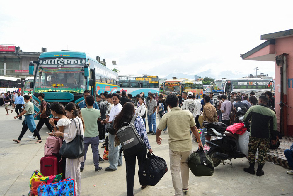 Nepalese citizens gather at New Buspark in Kathmandu, Nepal, on September 15, 2025, as life slowly returns to normal after violent protests and curfews. (Photo by Safal Prakash Shrestha / NurPhoto via AFP)