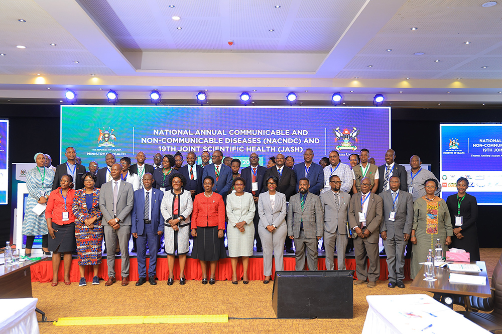 The Minister of Health, Dr Jane Ruth Aceng and the ministry's permanent secretary Dr Diana Atwine, pose for a photo with delegates at the conference. (Courtesy photo)