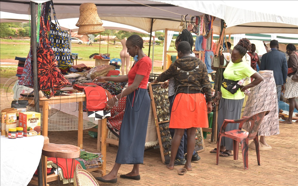 A craft shop is already up and running with potential buys viewing items of choice.