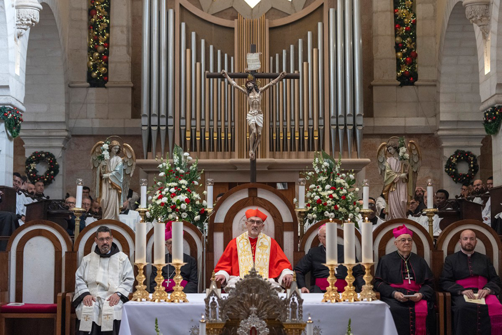 Latin Patriarch of Jerusalem Italian Pierbattista Pizzaballa leads the yearly Christmas mass in the Church of the Nativity in the Israeli-occupied West Bank city of Bethlehem, believed to be the birthplace of Jesus Christ, on December 24, 2025. (AFP)