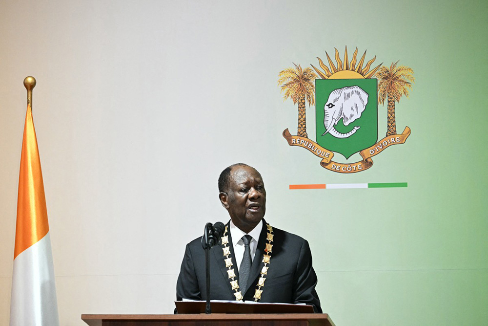 Ivory Coast President Alassane Ouattara pronounces his speech after having been sworn in at the Presidential Palace in Abidjan on December 8, 2025. (Photo by SIA KAMBOU / POOL / AFP)