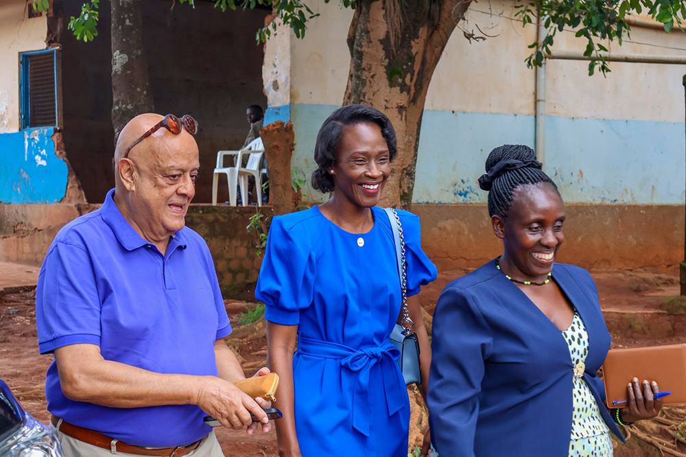 Roofings Group chairman Dr Lalani, his wife in the centre and the school headteacher moving around the school. (Courtesy)
