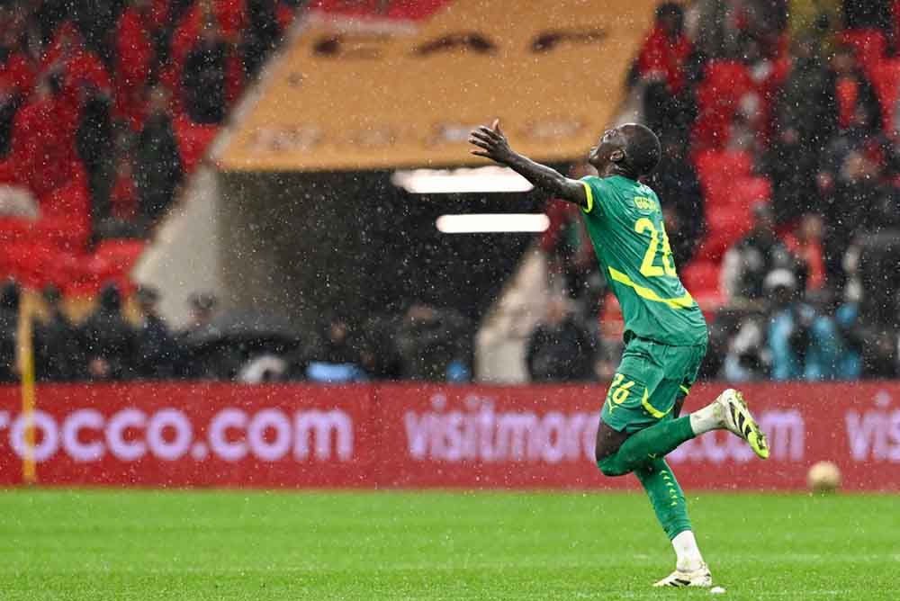 Senegal's midfielder #26 Pape Gueye celebrates after the Africa Cup of Nations (CAN) final football match between Senegal and Morocco at the Prince Moulay Abdellah Stadium in Rabat on January 18, 2026. (AFP Photo)