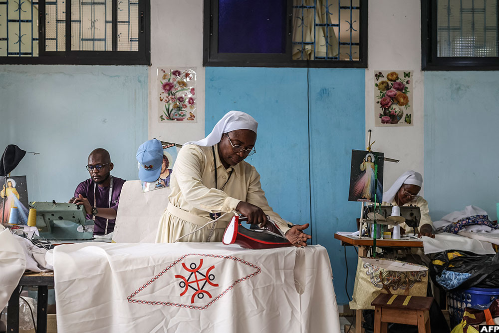 Nuns and a tailor work in the sewing workshop of the Congregation of the Daughters of Mary in Yaounde on April 14, 2026