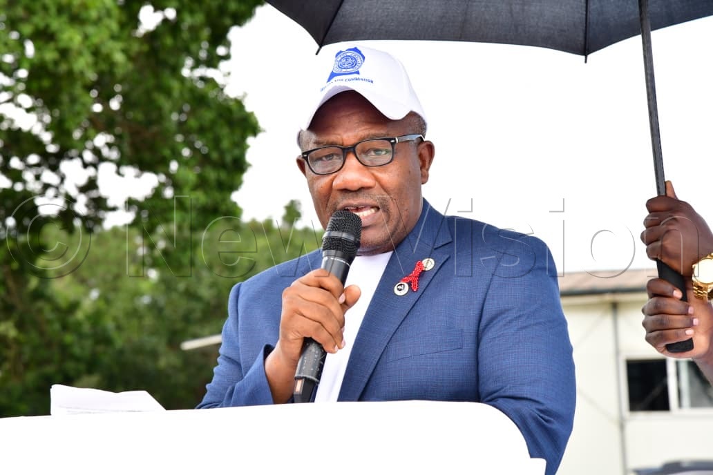 Dr Vincent Bagambe, Director of Planning and Strategic Information at the Uganda AIDS Commission, delivering his remarks during the event. (Credit: Mpalanyi Ssentongo)
