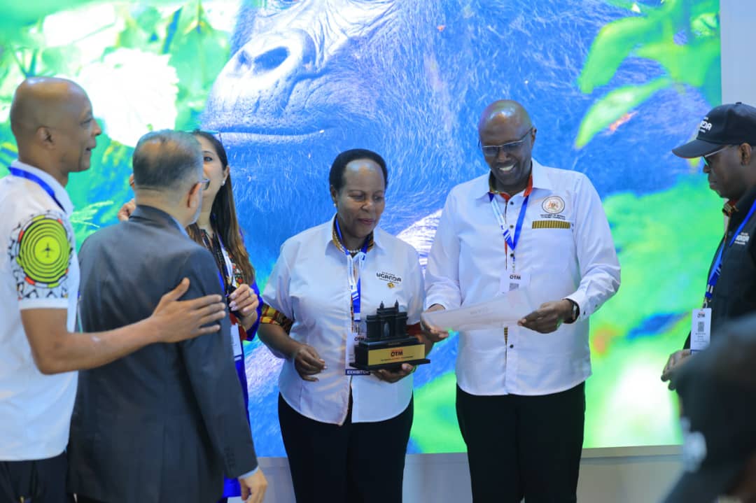 Ambassador Joyce Kikafunda, High Commissioner of Uganda to India, and Ambassador Richard Kabonero (center) and other Uganda participants with the award. (Courtesy)