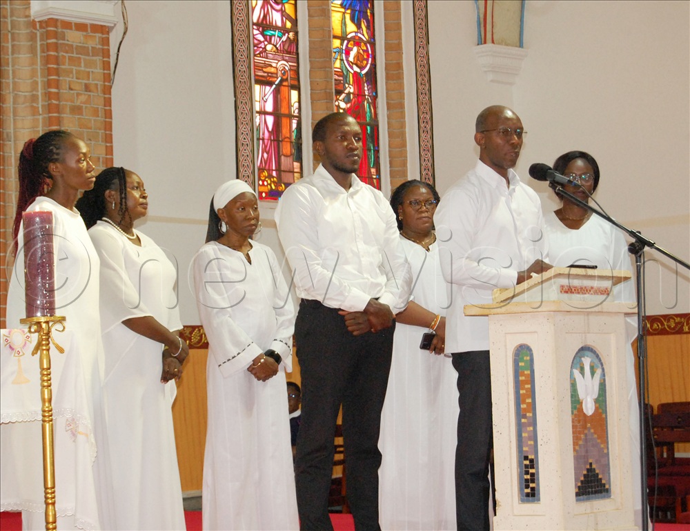The children led by Prof. Edrin Kyamanywa (behind microphone) eulogise their mother during the requiem mass at Lubaga Cathedral on Tuesday, January 20, 2026.