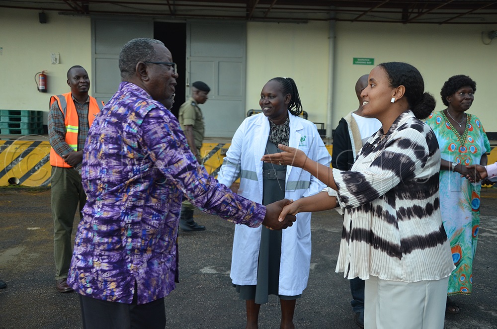 Tsega interacting with Prof. Mushemeza shortly after the meeting. (Credit by Emmanuel Alomu)