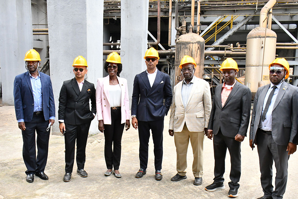 From L-R: The Head of OWC in Busoga sub-region, Col. Dhamuzungu Oguli, Modern Group's Rajin Patel, the Minister of State for Investment and Privatisation Evelyn Anite, Modern Group's Chairman Ashish Monpara, the Minister of Trade, Industry and Cooperatives Francis Mwebesa, the Minister of State for Trade David Bahati and Kaliro RDC Thomas Matende in a group photograph inside Kaliro Sugar factory during its launch in Kaliro district on Friday. (Photo by Donald Kiirya)