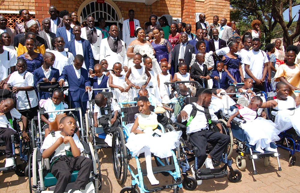 The Muwangas with their flowergirls/pageboys after their wedding Mass at St. Charles Lwanga Ggaba Catholic parish church in Makindye Division on August 15, 2026. (Photo by Mathias Mazinga)