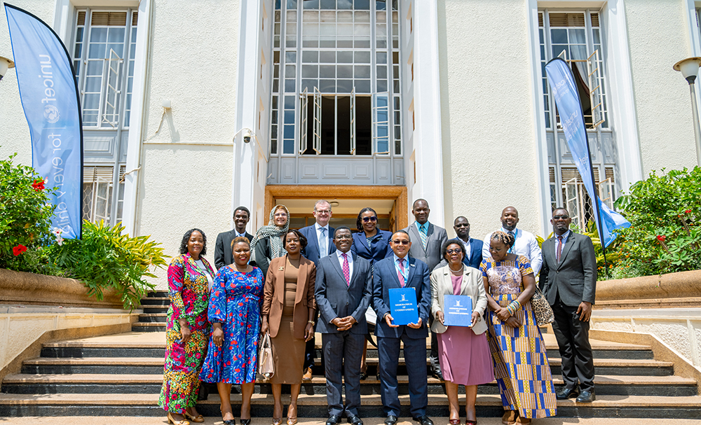 UNICEF delegation posing for a group photo with Buganda Kingdom officials. (Courtesy)