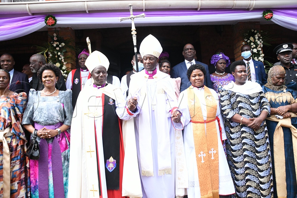 The Vice President Jessica Alupo, Nabbagereka of Buganda Sylvia Najinda, the Most Rev. Dr Stephen Samuel Kaziimba Mugalu, Archbishop of the Church of Uganda, the newly enthroned bishop of Namirembe diocese the Rt. Rev. Moses Banja and his wife Rev. Conon. prof. Olivia Nassaka Banja and other clergy members pose for a group picture at Namirembe cathedral on Dec. 10, 2023. (Photo by Maria Wamala)