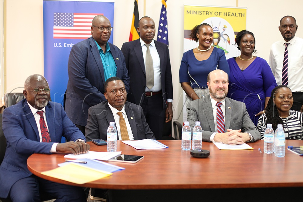 Ministry of Health officials together with other health stakeholders pose for a group photo with US Ambassador William Popp after the launch. (Photo by John Musenze)