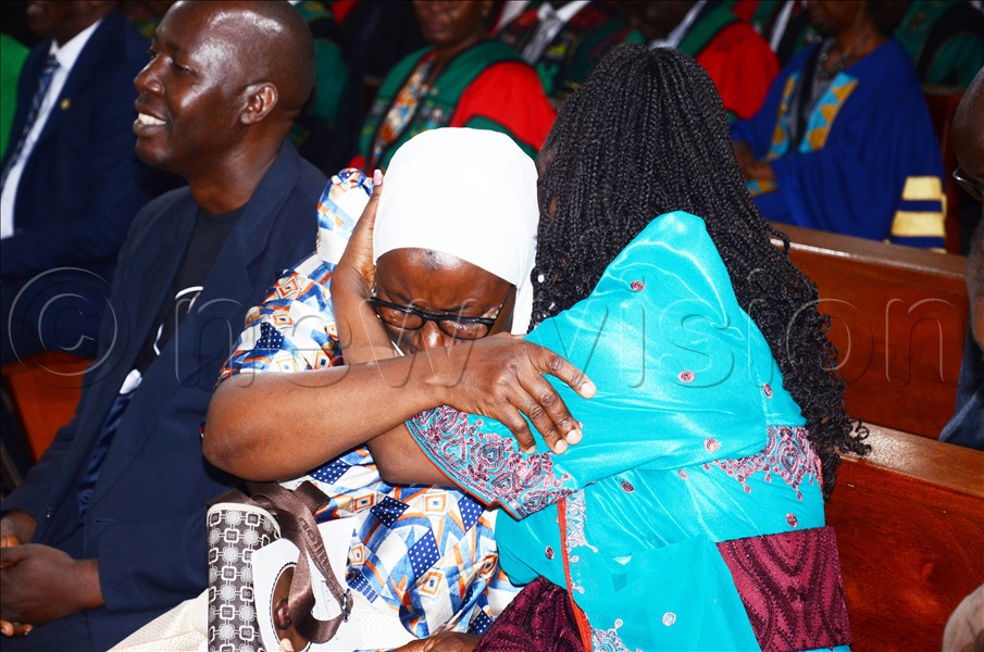 The Kyambogo University Head of Mathematics and Statistics, Dr. Hasifa Nampala, mourns during the prayer mass of the deceased. (Credit: Isaac Nuwagaba)