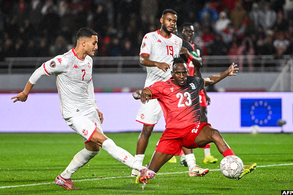 Elias Achouri scored on either side of the interval as Tunisia beat Uganda on Tuesday night.