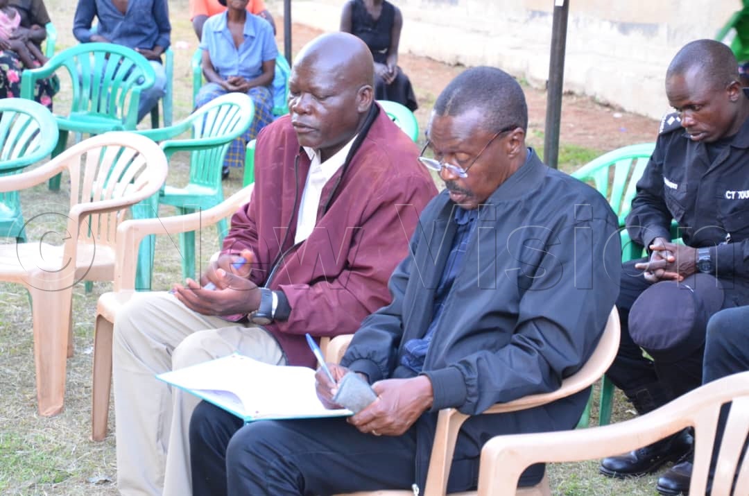 Muntu signing in the visitors book. (Credit: Stuart Yiga)