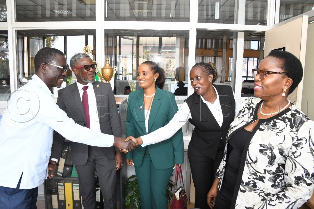 Vision Group Deputy Editor in Chief, Felix Osike (left), interacting with the visiting UNOC officials. (Credit: Mpalanyi Ssentongo)