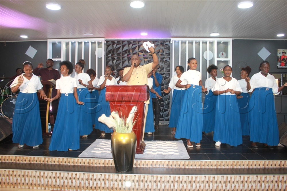 Bishop Dr Samuel Lwandasa leading the worship with Mt. Lebanon Mass Chior.