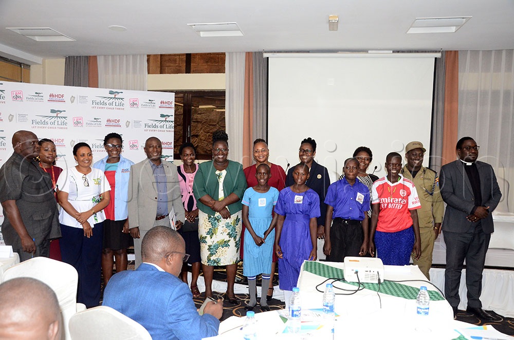 Participants pose for a group picture during the Inception Breakfast Meeting for the sixth phase of the I AM GIRL project at Protea Hotel Kampala on Thursday. (Credit: Lawrence Mulondo)