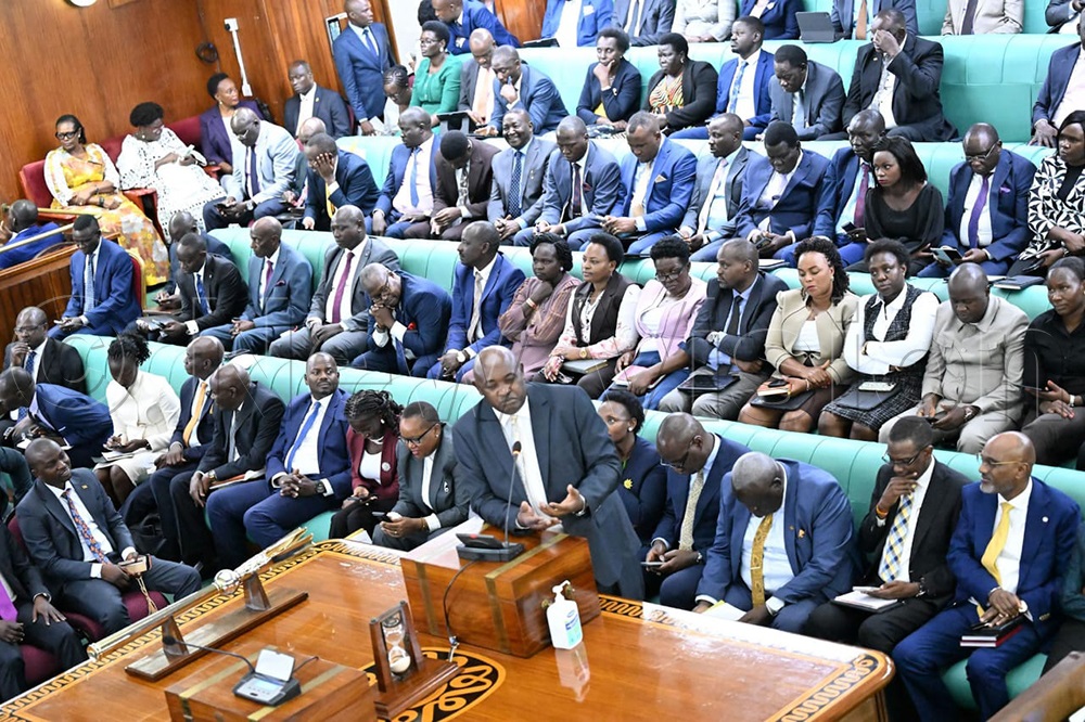 Health Minister Dr Chris Baryomunsi addressing legislators on Wednesday (August 12). (Credit: Maria Wamala)