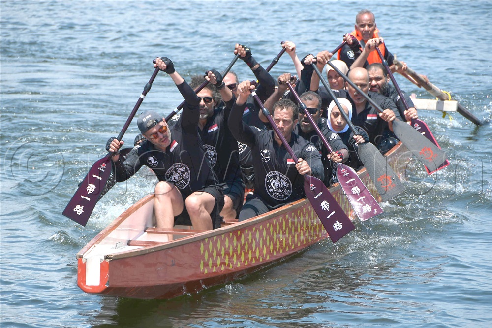 Egyptian Dragon Boat team pedaling after finishing a heat at Kawuku -Burigi Nanjing Beach at teh African Champinships October 3, 2026.