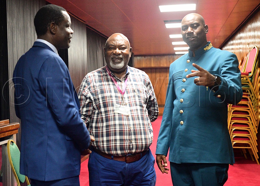 (L-R) Rwabwogo Businge, General Manager Operations Mukwano Industries (U) Ltd, Geoffrey Ekanya MP Tororo County North and Dickson Kateshumbwa MP Sheema municipality interact after appearing before the finance committee of parliament on April 13, 2026. (Photo by Maria Wamala)
