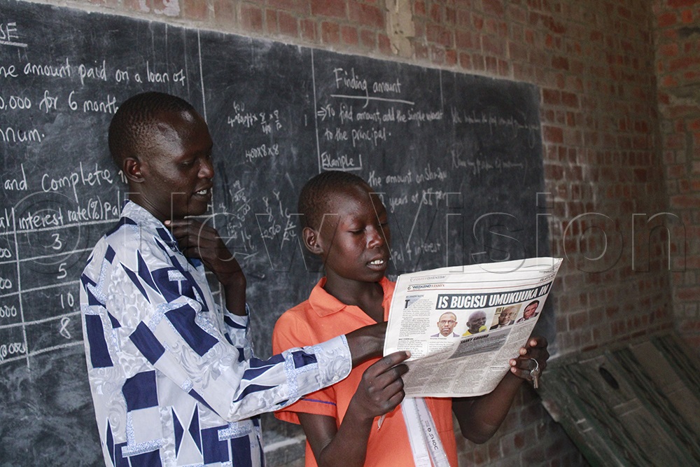 Learners also enjoy reading and discussing current affairs. (Credit: Ritah Mukasa)
