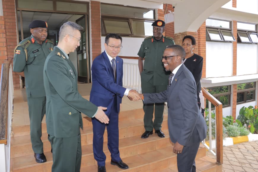 Minister of Defence and Veterans Affairs Kiryowa Kiwanuka receives Chinese Ambassador Wu Guangrong, who paid a courtesy call on him at the ministry headquarters in Mbuya, Kampala. (Courtesy)