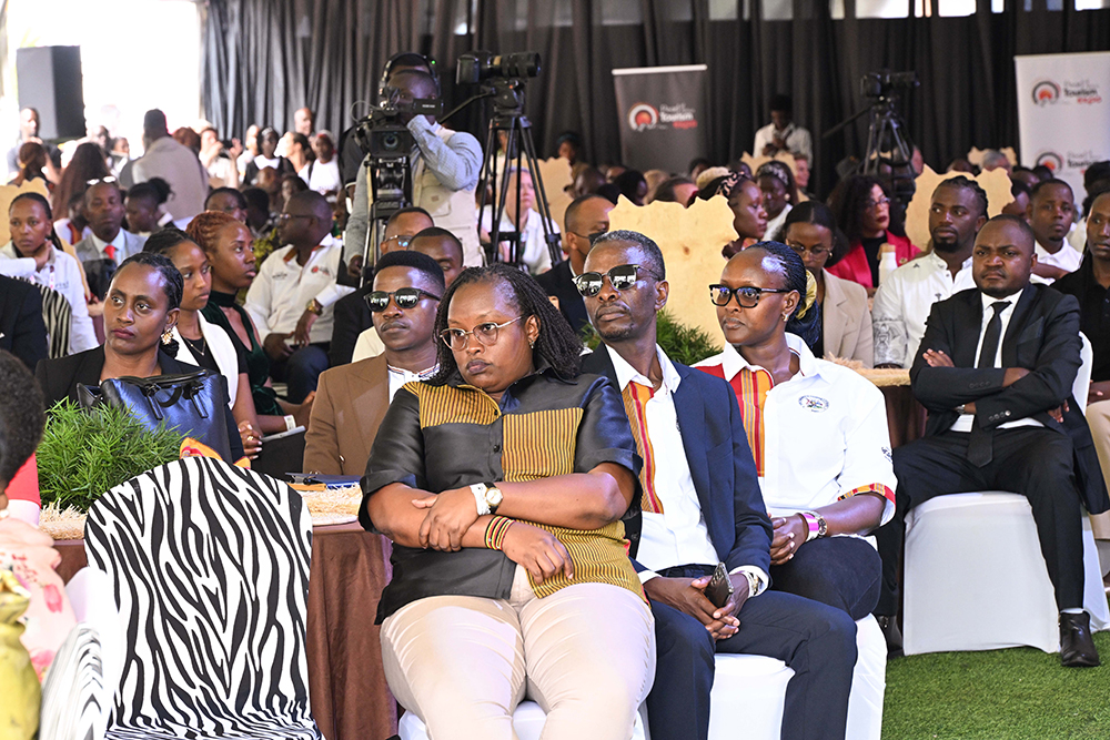 Some of the guests who turned up for the Pearl Of Africa Tourism Expo at Speke Resort Munyonyo listening to President Museveni's address on Thursday.