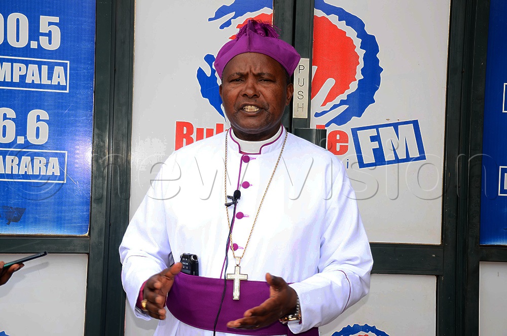 Mukono Diocese Bishop Rt. Rev. Enos Kitto Kagodo elaborating how the construction of the cathedral shall boost the diocese's work during an interview at Vision Group offices on Wednesday. (Photo by Isaac Nuwagaba)