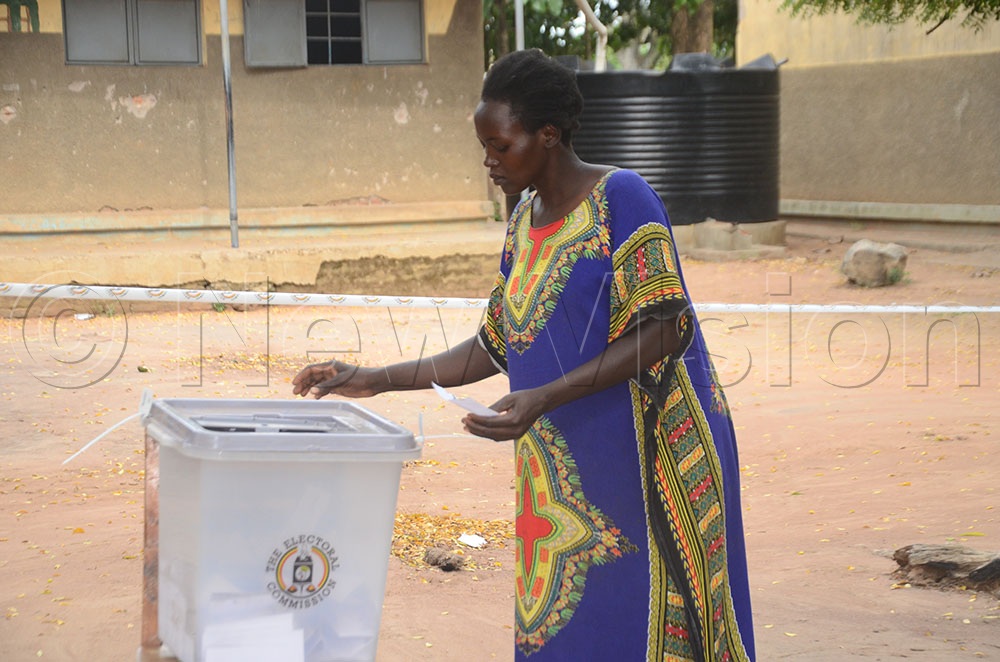 A woman casting her vote at Ukusijoni P7 (Odranga) polling station in Adjumani West Constituency. (Credit: Adam Gule)