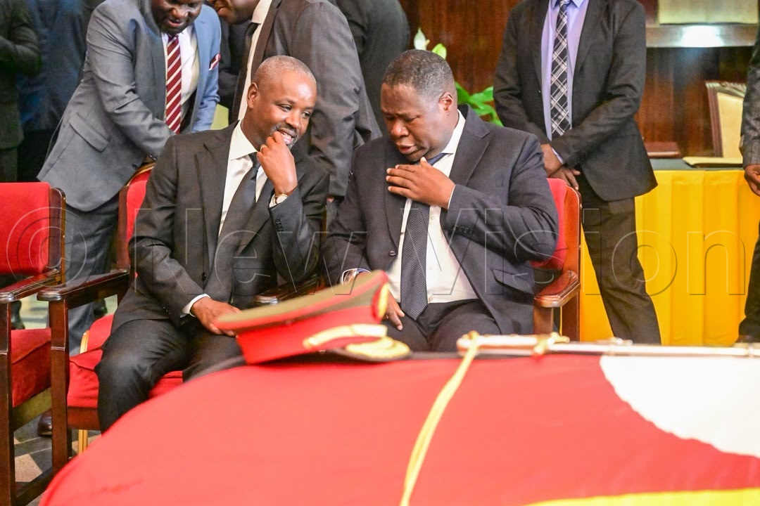 Speaker of parliament Jacob Marksons Oboth chats with his deputy, Thomas Tayebwa.