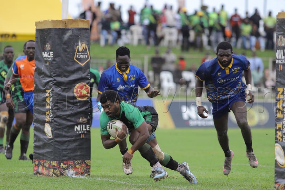 Heathens concede a try to Kabras of Kenya during Saturday's encounter at Wankulukuku. (Photo by Johnson Were)