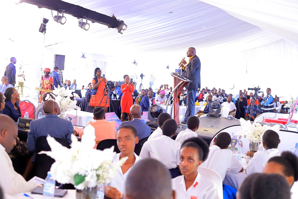 Valentine Muhereza commonly known as Kachaina, a comedian and popular figure in Western Uganda, delivering a talk at the symposium. (Photo by Abdulkarim Ssengendo)