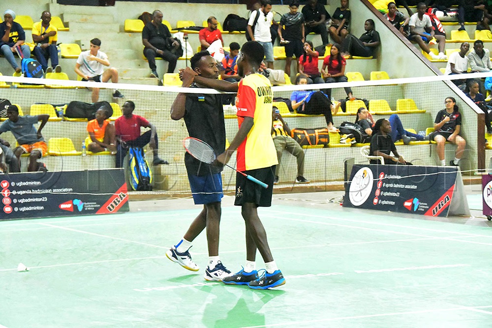 Badminton player Augustus Owinyi (right) wins Rwandan player Ifabrice Iratukunda 2-0 at the 2025 Uganda Internatonal challenger Series Feb 19 at Lugogo Indoor Arena. (Photo: Silvano Kibuuka)