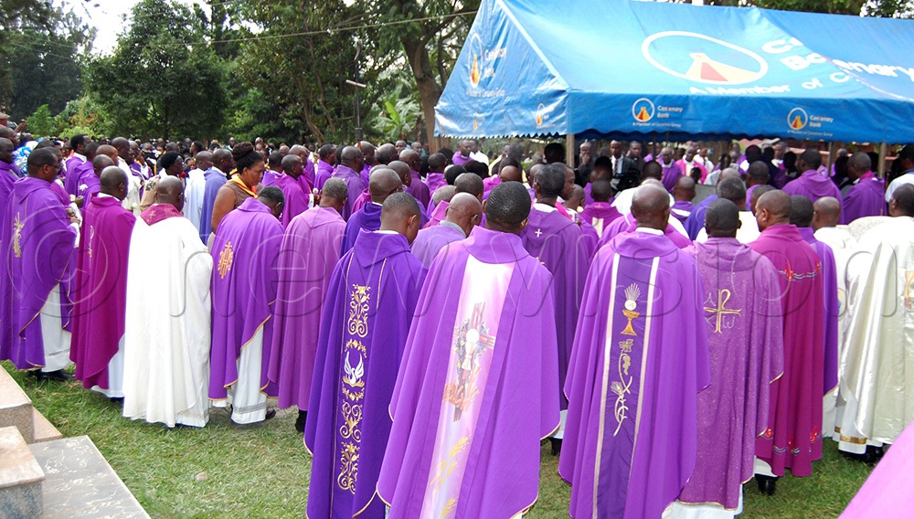 Grief-stricken Catholic priests during the burial of their senior brother Fr. Dr James Kabuye, at Kiyinda-Mityana Cathedral on Saturday, September 19, 2026. (Photo by Mathias Mazinga)