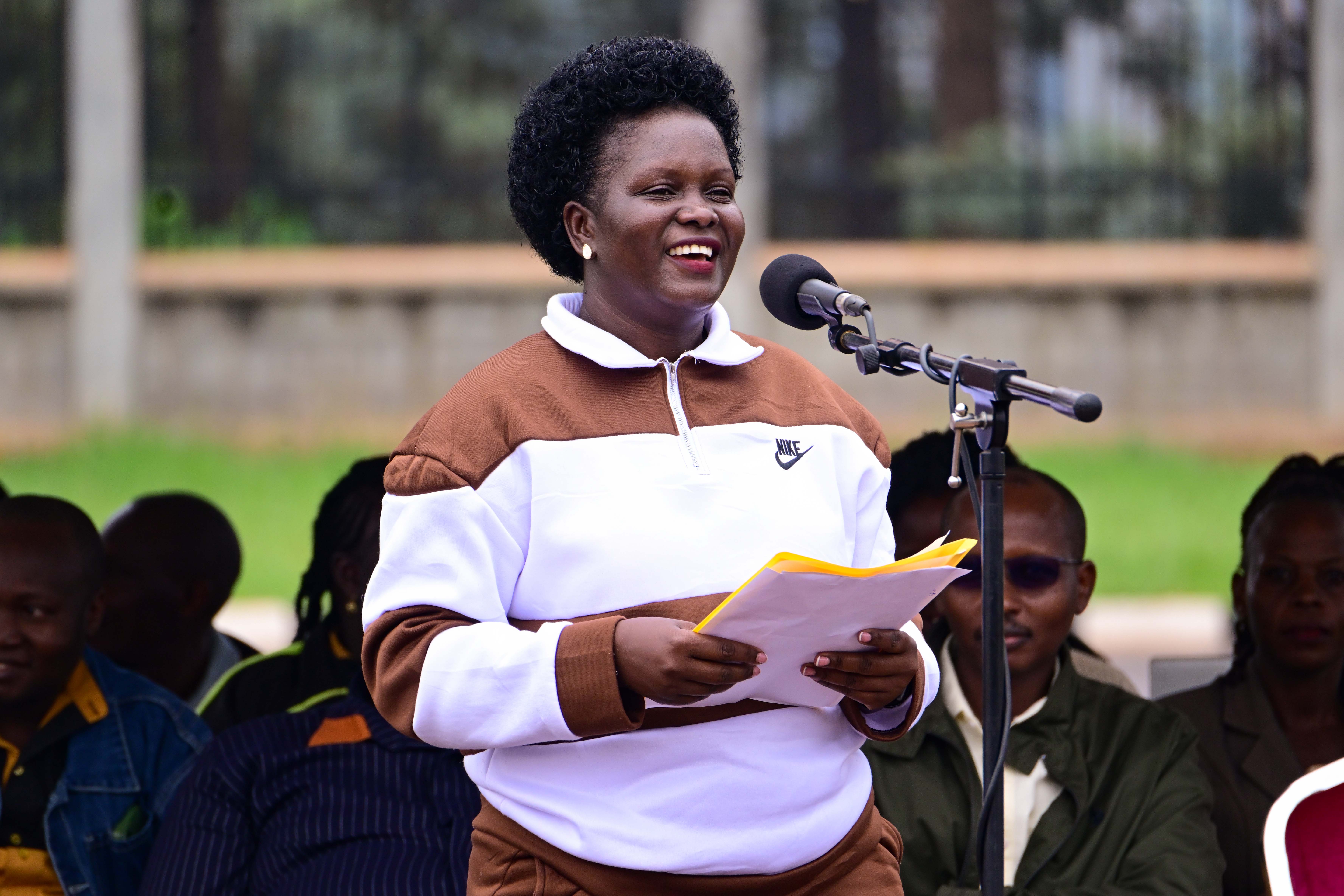 Hellen Seku, the commissioner Patriotism, addresses mechanics and garage operators from Kampala metropolitan region at Kololo on Sunday. 