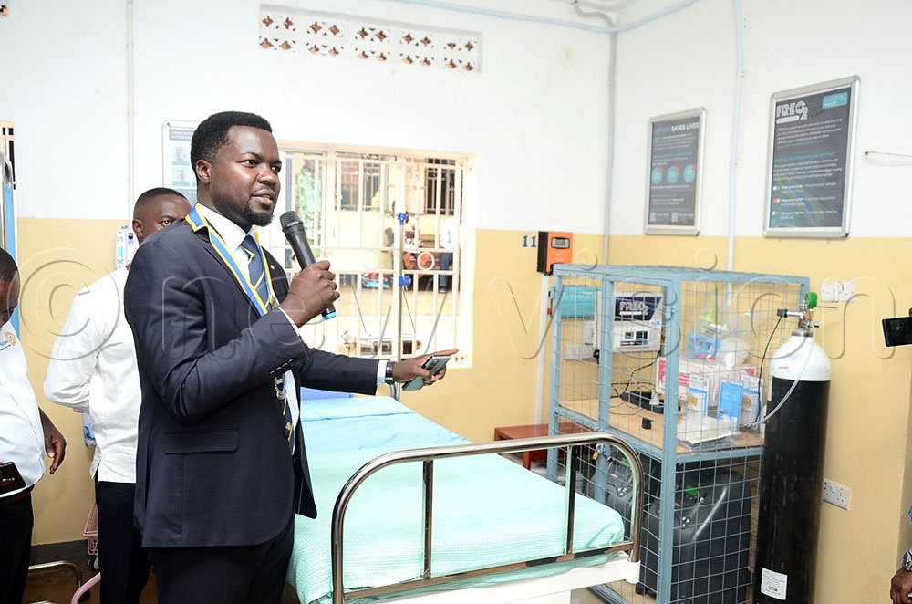 Kenneth Rubango, the president of the Rotary Club of Muyenga Tank Hill showing part of the oxygen generation system in the new neonatal intensive care unit at Kalangala health centre IV. (Photo by Lawrence Mulondo)