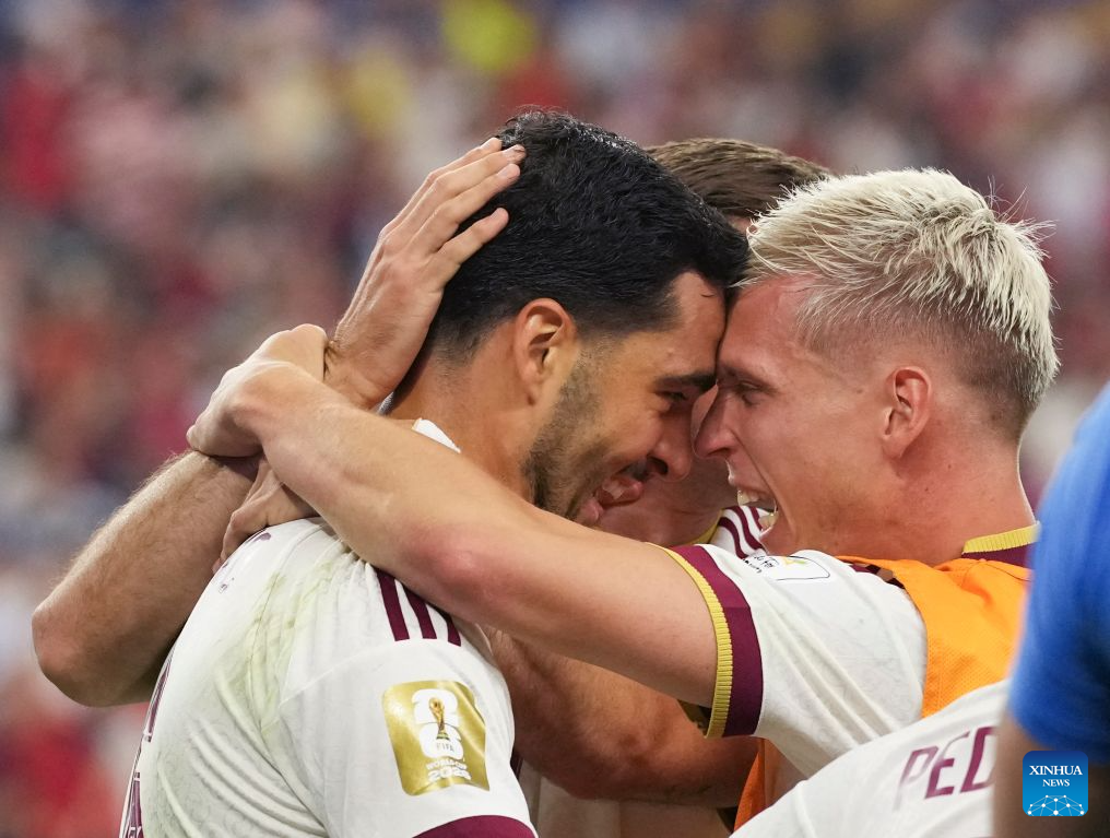 Mikel Merino celebrates the winning goal with teammates. (Xinhua/Wu Xiaoling)