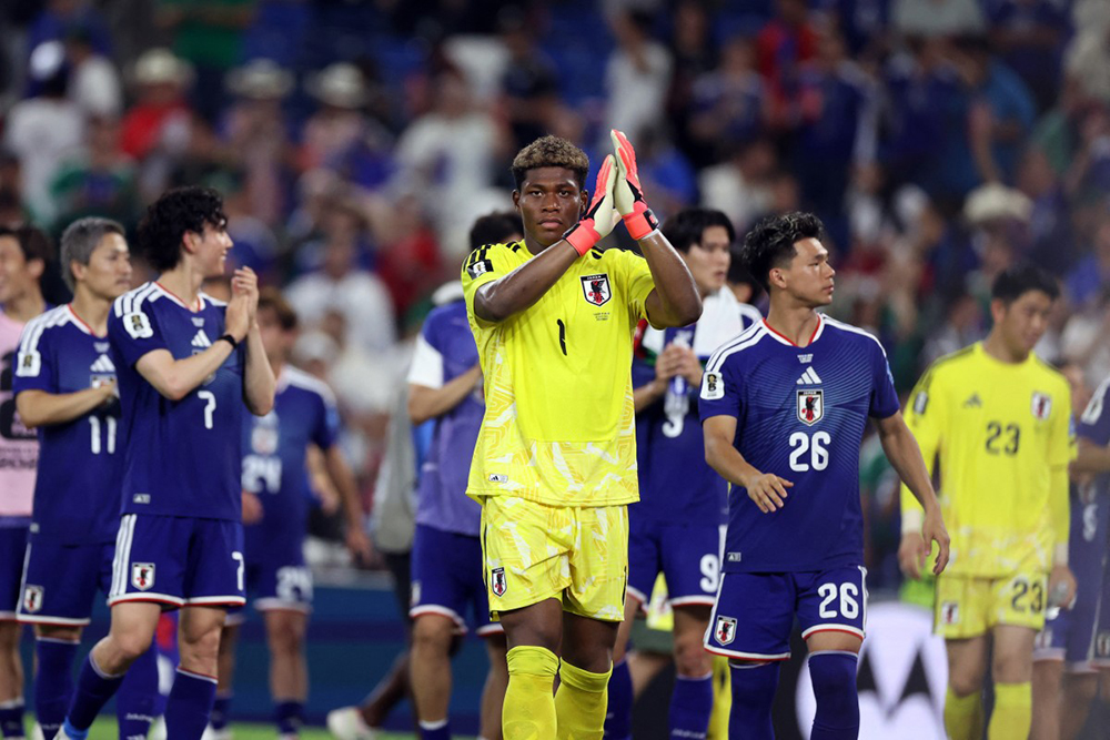 Japan's goalkeeper #01 Zion Suzuki and teammates celebrate at the end of the 2026 World Cup Group F football match between Tunisia and Japan at the Monterrey Stadium in Guadalupe, Mexico, on June 20, 2026. Japan defeated Tunisia won 4-0.
