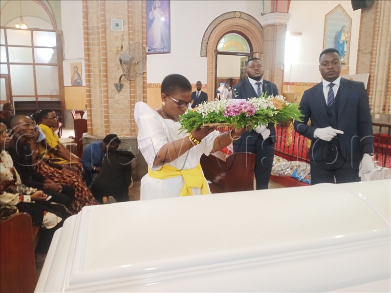 Minister, Office of the Prime Minister (General Duties), Justine Kasule Lumumba, lays a wreath on Wamika’s casket.
