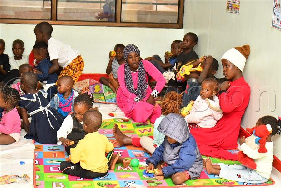 Some of the caretakers at the Lugazi central market day care centre.