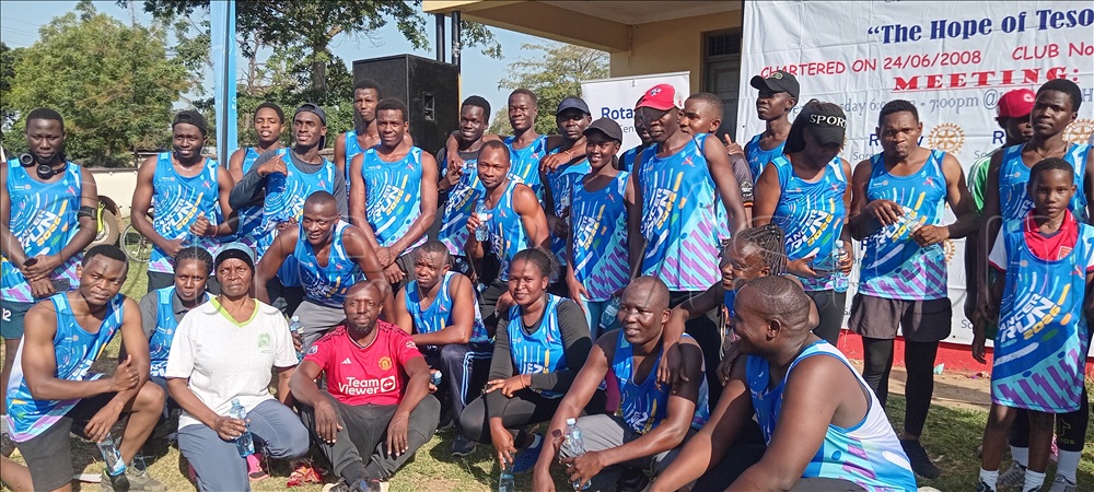 Participants in a group photo at Soroti sports ground after cancer run