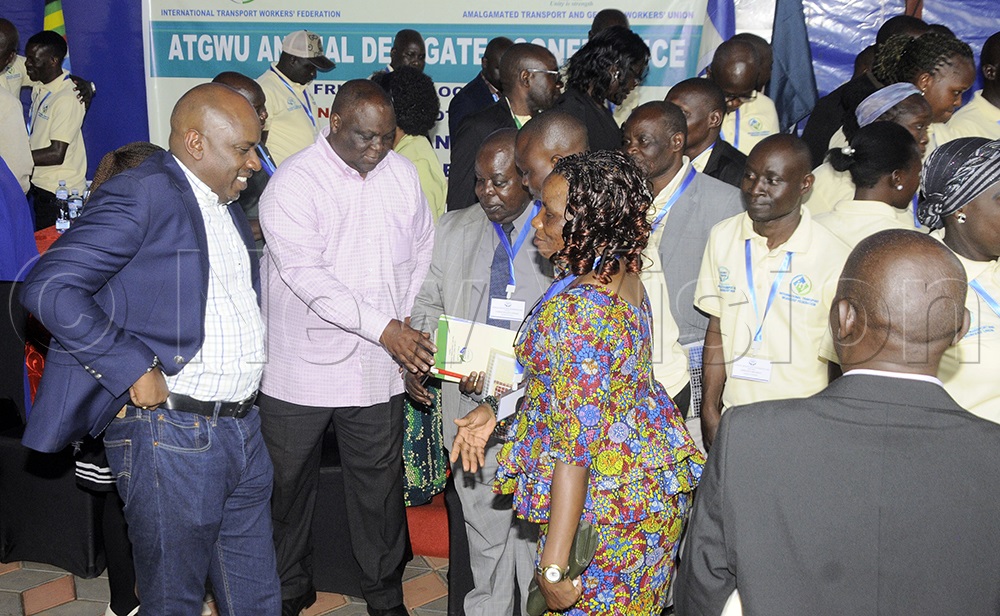 The Secretary General of the National Organisation of Trade Unions (NOTU), Richard Bigirwa (second from left), talks to the members Agalgament Transport and General Workers Union (ATGWU) after the annual general meeting in Kajjansi subcounty in Wakiso district, November 2, 2025. (Photo by Wilfred Sanya)