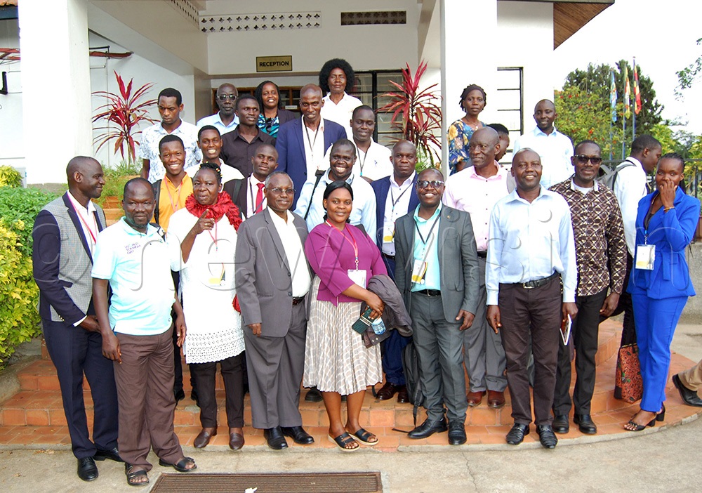The academicians/researchers who graced UMU's 16th Research Conference share a photo moment after the closing ceremony. (Photo by Mathias Mazinga)
